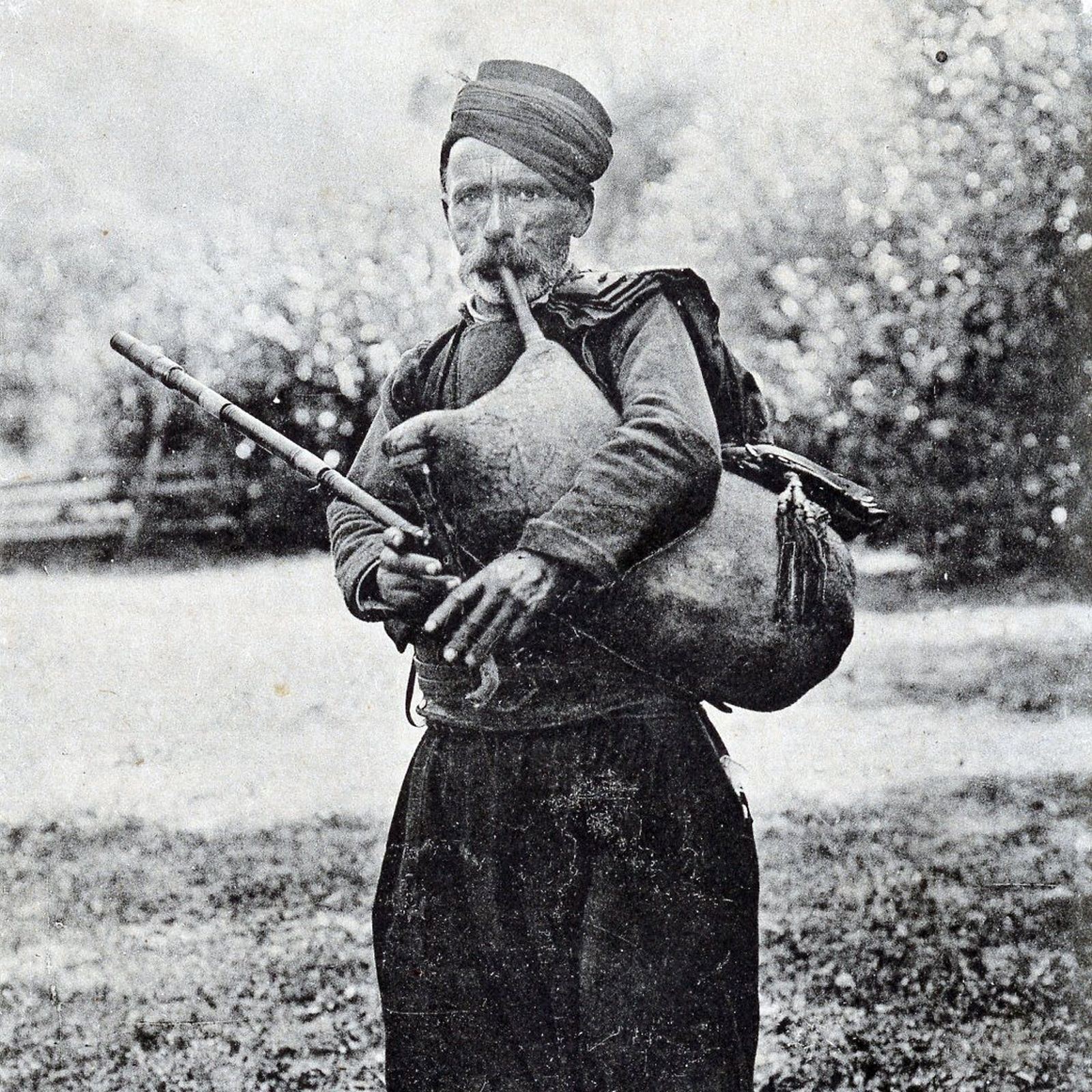 Bagpiper - black and white photo.